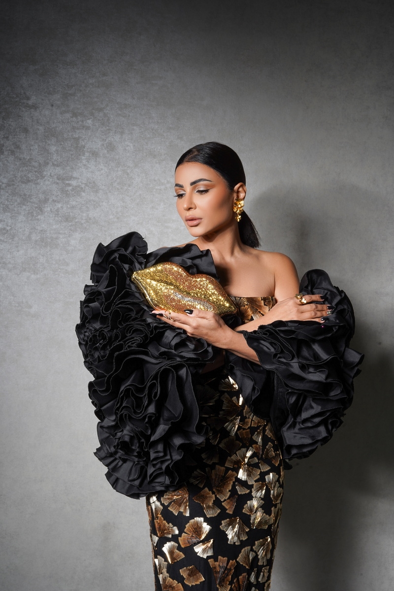 Mahira Abdelaziz Shines in Tony Ward Evening Dress at